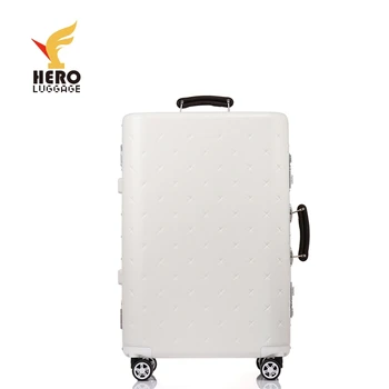 white hard suitcase