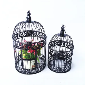 Image of European-style iron decoration bird cage window display small white photography props wedding decor metal wire bird cages birds