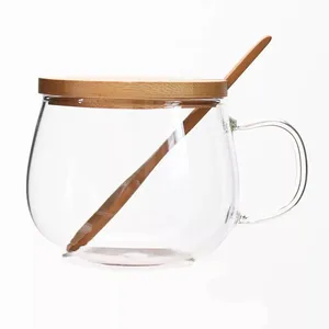 Image of new designed glazed round glass cup with bamboo lid and spoon