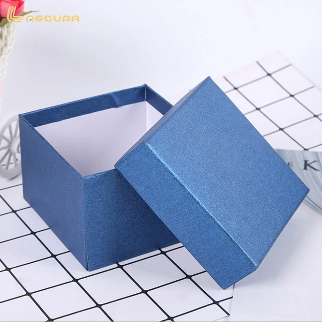 small cardboard boxes with lids