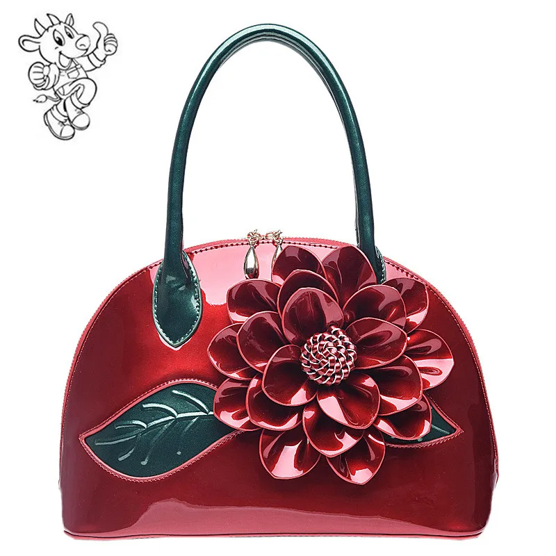 

Bag female 2019 new pearly patent leather ladies handbag china version of the small flower shell bag shoulder bag female OEM