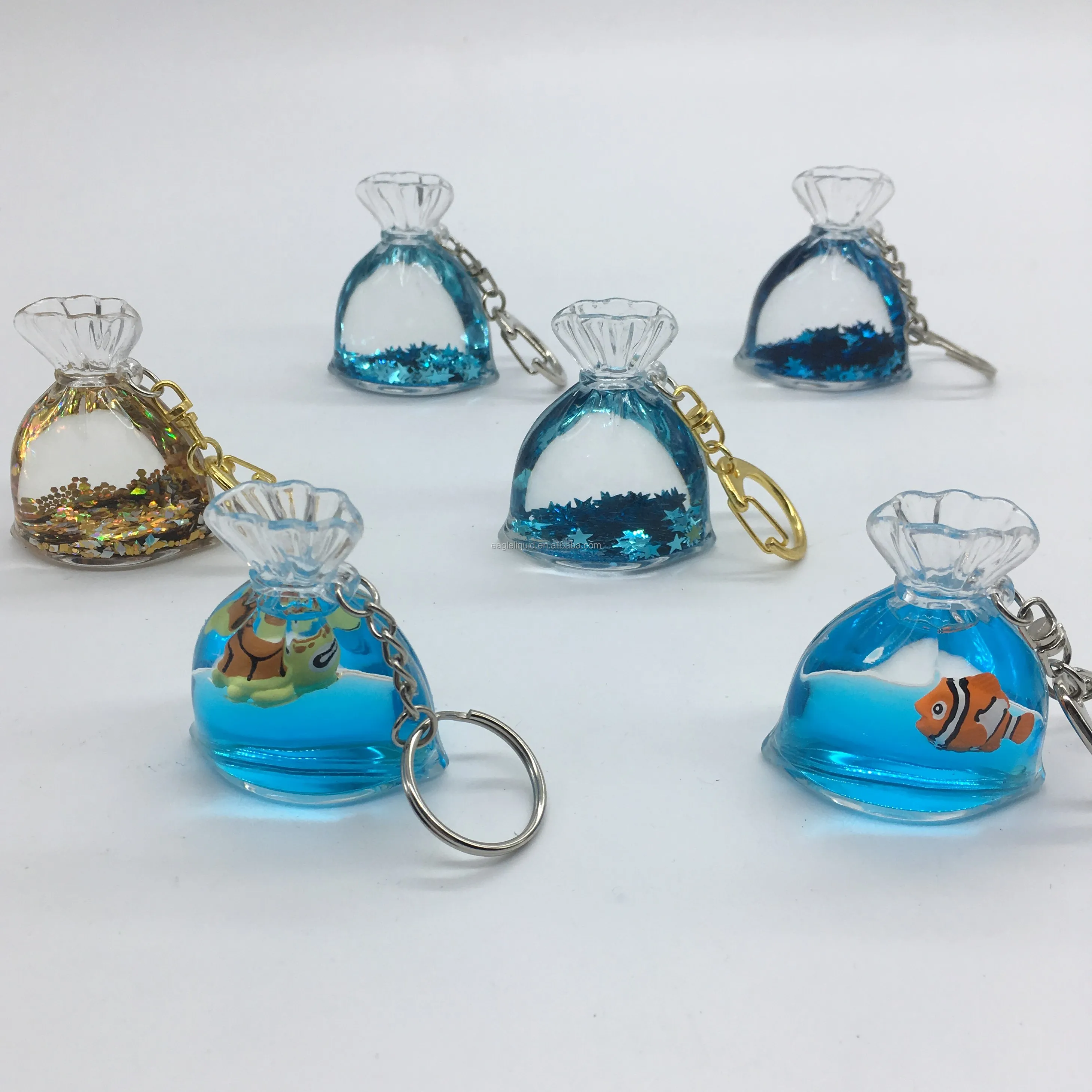 Floating keychain with 3D floater purse shape wholesale custombglitter liquid oil water keyring
