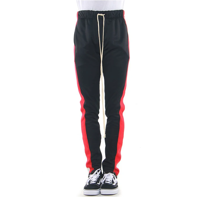 red joggers with white stripe