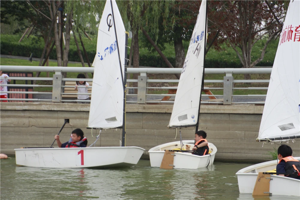 
school boys OP sail boat for School Curriculum 