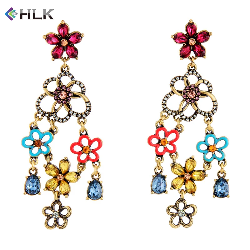 

Fancy design hanging earrings indonesia wholesale jewelry Hollow Out Crystal Flowers Chandelier Earring