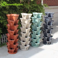 

Vertical garden self watering stacked planters plastic flower pots