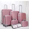 Dongguan factory wholesale ABS 6pcs travel luggage set and 4 make-up bags for women