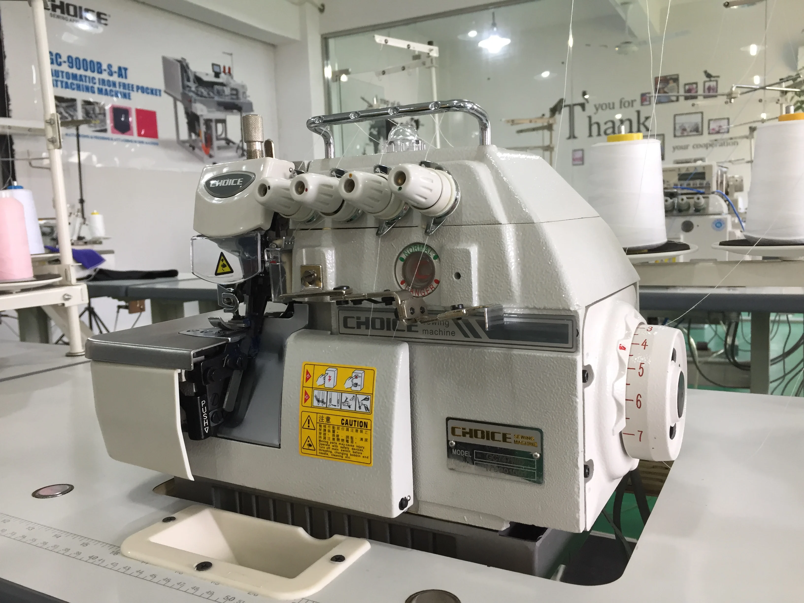 
Golden Choice GC747 high speed direct drive four thread overlock sewing machine industrial 