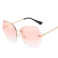

New Ocean Film Trendy Sun Glasses trimming Women Rimless Metal Sunglasses custom sunglasses