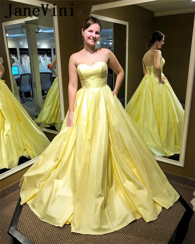 yellow puffy prom dress
