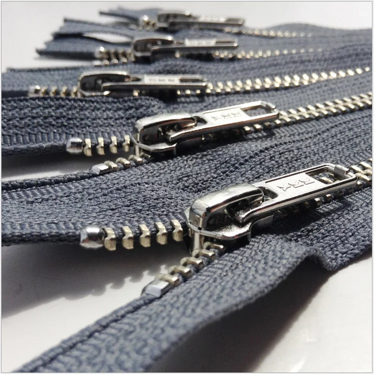 Молнии ykk для куртки. YKK 5s. YKK Zipper. Молния YKK #5 Excella. Молния металлическая YKK.