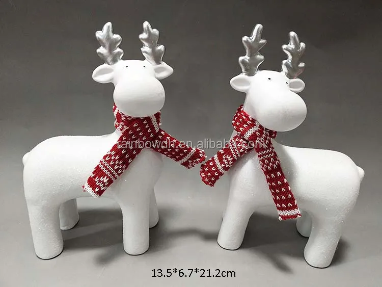 white ceramic reindeer figurine