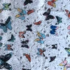 100%polyester embroidery flower and butterfly designs knitted tricot fabric for garment
