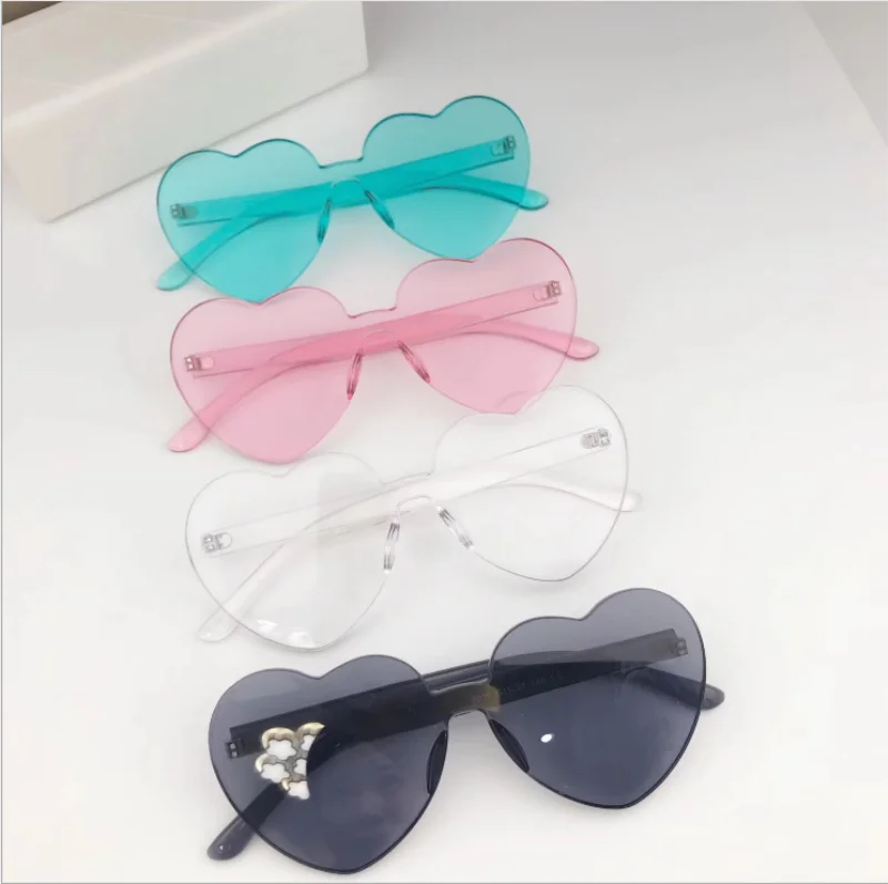 

Amazon Hot Sale Candy Color Transparent Heart Sunglasses Colorful Heart Rimless Sunglasses Women