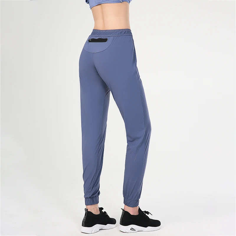 

2019 New yoga leggings laser punching running pants zipper pocket style summer fitness outdoor casual pants for women