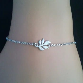 thin silver bracelet with charm