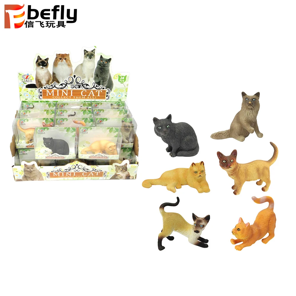 small plastic toy cats