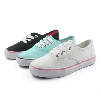 boys white canvas trainers