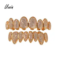

Hiphop Fashion Copper Grillz Sets Iced Out Body Jewelry Dental Trendy Unisex Irregular Fangs Grillz Wholesale Gifts