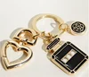 Fashion souvenir perfume bottle and flower soft enamel metal keychain