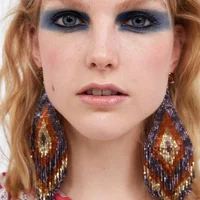 

14811 Barlaycs wholesale beaded taesel earrings