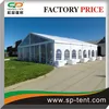 20x20m clear gable end tent weighted into grass mud grounds