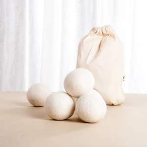 Image of handmade 6 pack 100% natural new zealand wool dryer balls with cotton bag printed logo