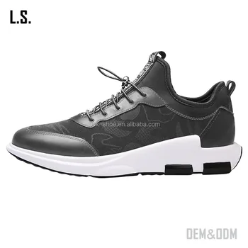 branded black sports shoes