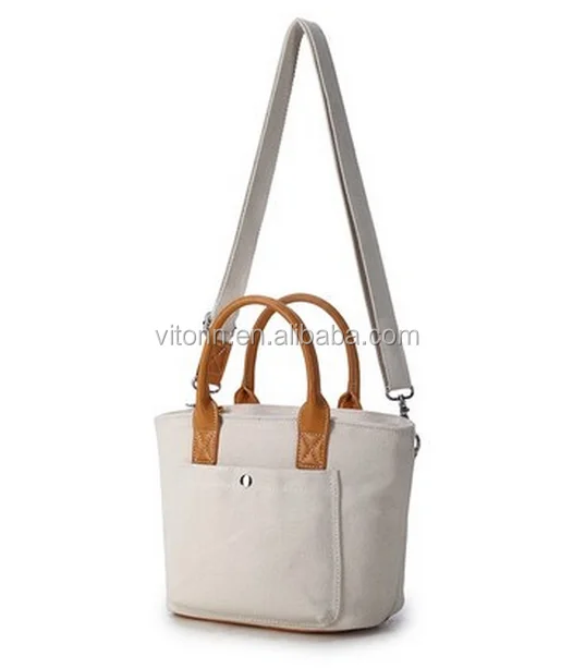 white canvas shoulder bag