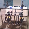 Acid-base neutralization circulation water chemical dosing system