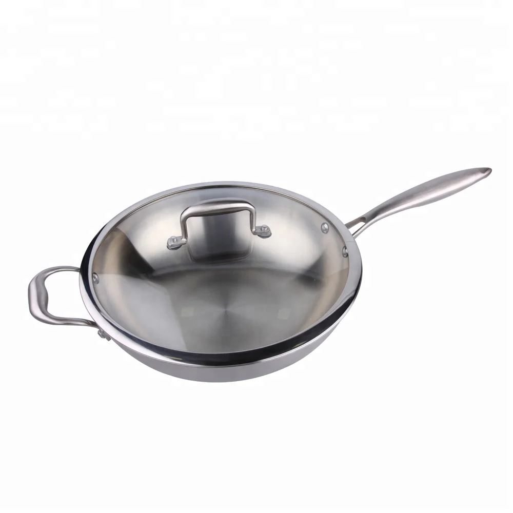 

Japanese new technology multi-ply clad stainless steel induction wok pan 32cm diameter with glass lid for sale