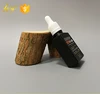popular essential oil bottle 30ml rectangle black glass e liquid bottle with new design tamper resistant topper