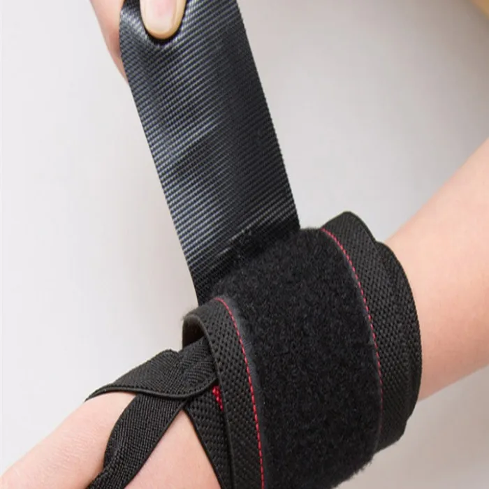 Free sample Professional Grade Wrist Wraps With Thumb Loops Wrist Support Braces for Men & Women .jpg