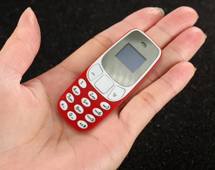 

2019 hot selling Mini dual SIM card 2g GSM mobile phone Small Portable ear Phone OEM ODM