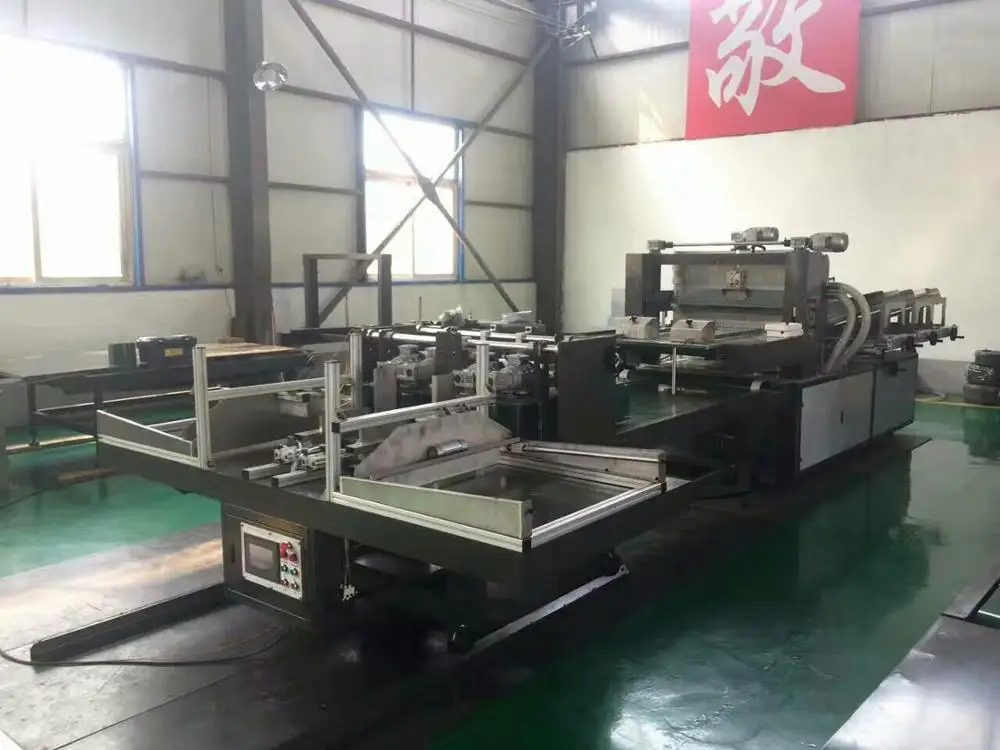 Corrugated Cardboard partition assembler machine.jpg
