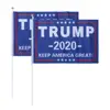 Mini held waving Supporting Trump hand flag with pole