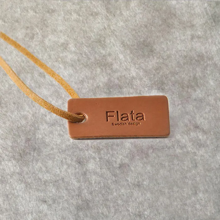 

Debossed logo leather hang tag with leather string, Customized
