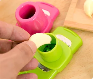 Image of Stainless steel garlic presses vegetable grater cutter helper stir garlic peeler multifunctional cooking tool