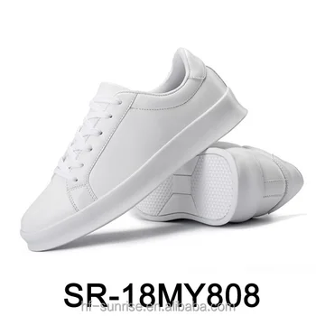 white color sports shoes