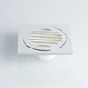 Bathroom floor drain tile inserted into linear shower drain