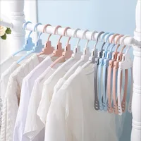 

cheap hanger Multi-functional plastic clothes hanger folding magic hangers for clothes