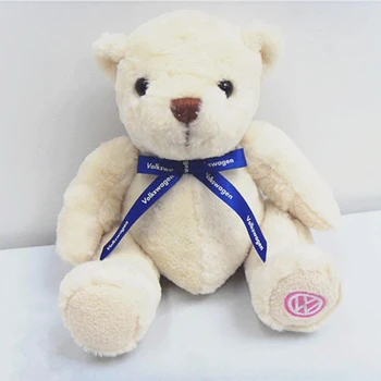 teddy bear with blue ribbon