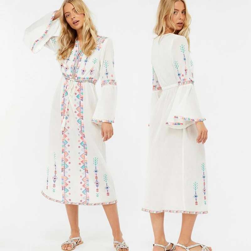 white linen dress with sleeves