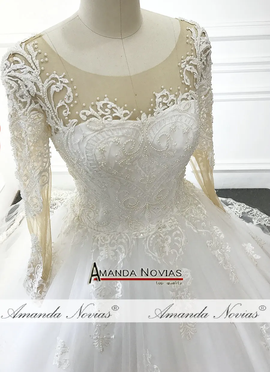 amanda-novias-top-10-long-sleeve-pearls-ball-gown-description-of