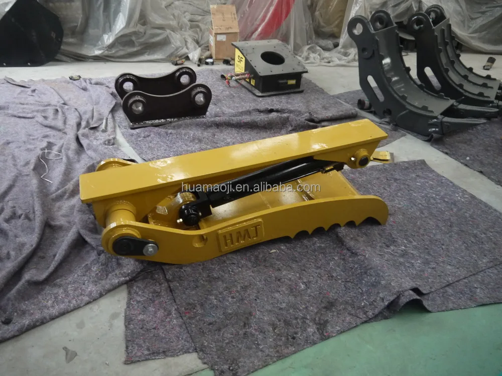 excavator with construction thumb Excavator with construction thumb