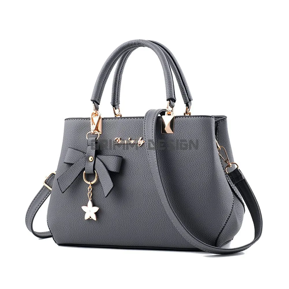 China Guangzhou Market Cheap Pu Leather Female Wholesale Lady Women