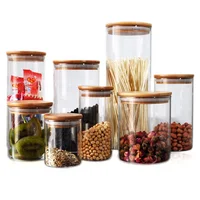 

Borosilicate glass storage jar with bamboo lid for tube shaped for glass spice jar with wooden lid