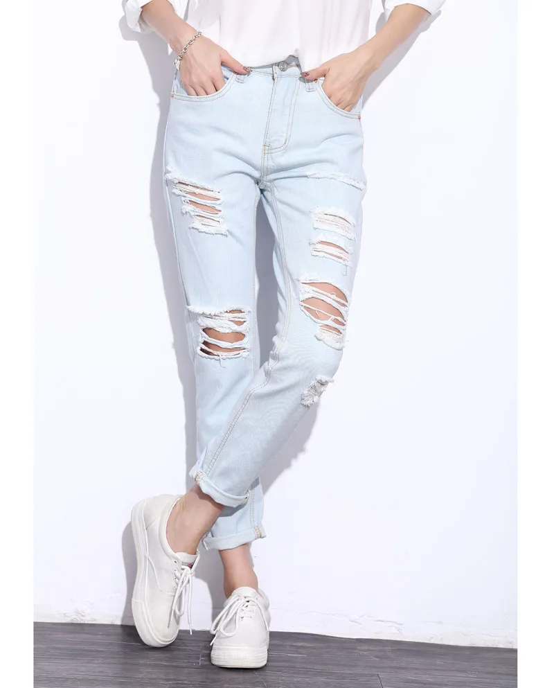 light blue ripped baggy jeans