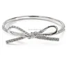 Pave bow bangle bracelet