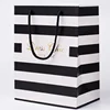 /product-detail/china-manufacturer-white-luxury-printed-gift-custom-shopping-paper-bag-with-your-own-logo-62010840130.html